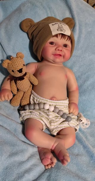 Tierno reborn silicona niño  con pelo caoba
