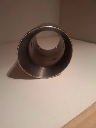 Cola de escape cromada