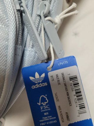 Mochila Adidas pequeña azul y blanca