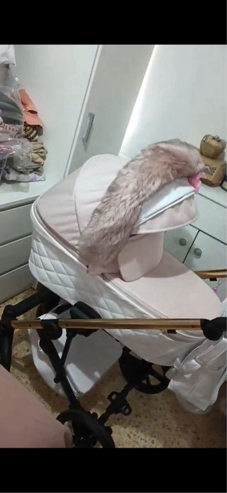 Carro de bebé rosa   Lleva muy poco uso esta nuevo