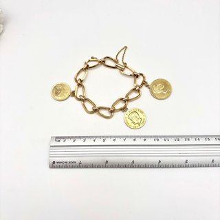 Pulsera de oro 18kt con monedas
