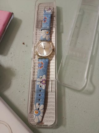 Reloj Swatch Transparente Flores