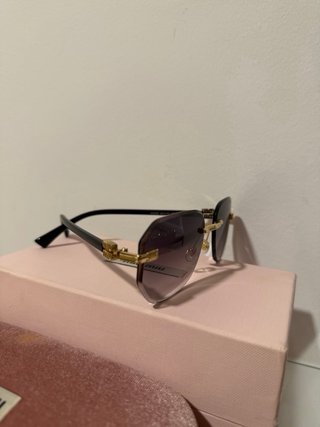 Gafas de sol Miu Miu Octagonales Doradas Grises