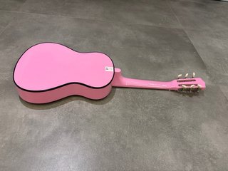 Guitarra rosa infantil con pua