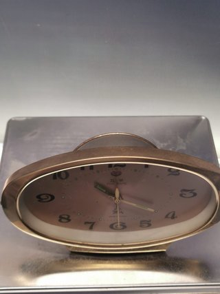 Bonito reloj a cuerda FIVE RAMS made in china