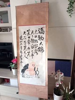 Pittura a rotolo con Buddha sorridente