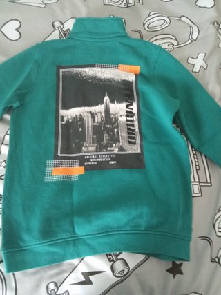 Sudadera cuello alto con cremallera y bolsillo