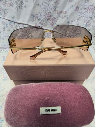Gafas de sol Miu Miu doradas y rosas