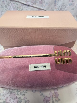 Gafas de sol Miu Miu doradas y rosas