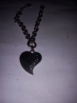 Titolo: Bracciale GUESS originale con ciondolo a c