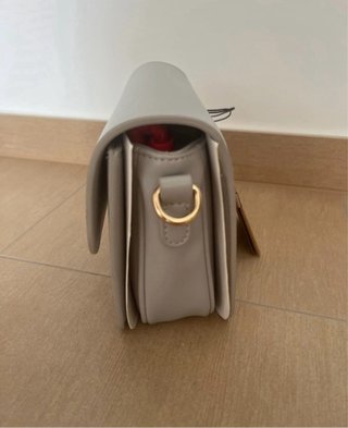 Borsa Valentino grigia con logo oro
