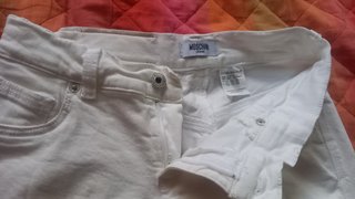 Jeans bianchi vita bassa gamba larga svasata