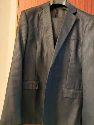 Abito uomo grigio gessato