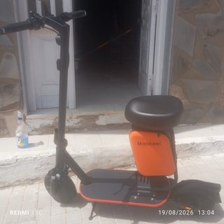 Patinete Eléctrico Naranja y Negro