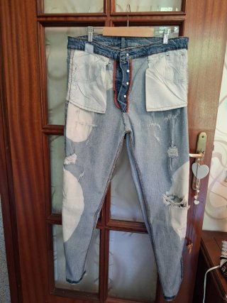 Pantaloni uomo jeans strappati effetto used