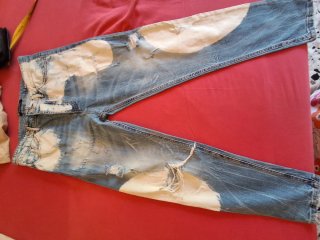 Pantaloni uomo jeans strappati effetto used