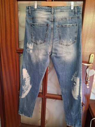 Pantaloni uomo jeans strappati effetto used
