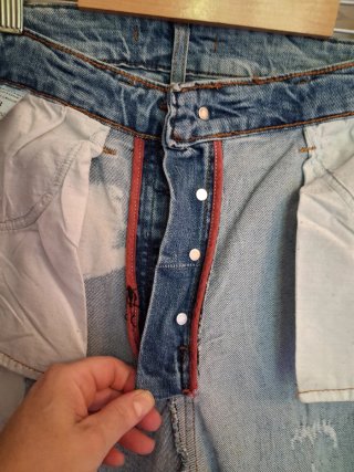 Pantaloni uomo jeans strappati effetto used