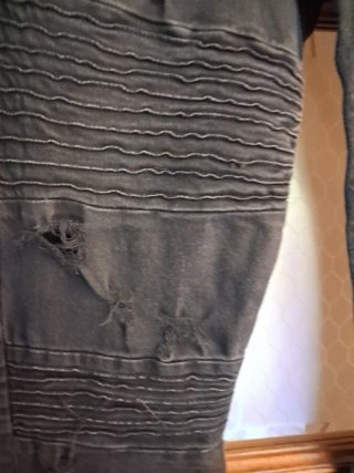 Pantaloni uomo neri strappati