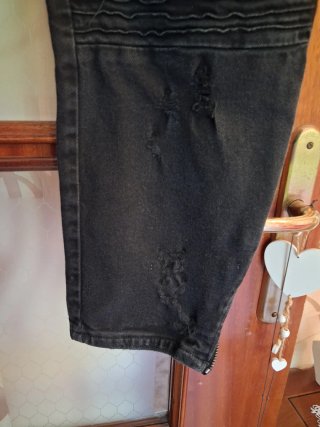 Pantaloni uomo neri strappati