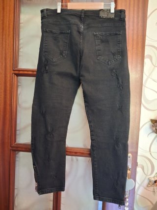 Pantaloni uomo neri strappati