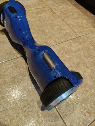 Hoverboard azul con bolsa y cargador