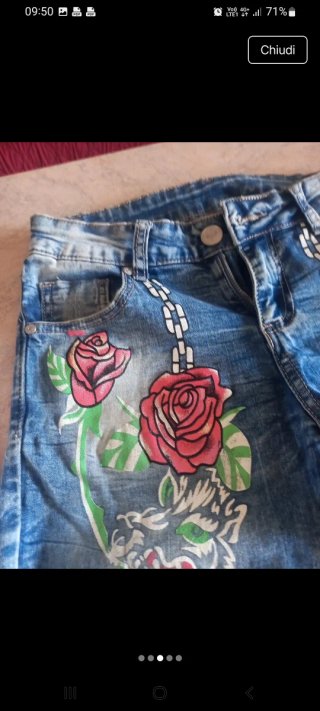 Jeans donna con rose e catene