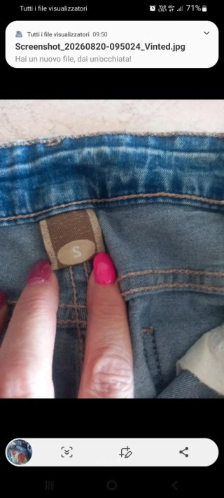 Jeans donna con rose e catene