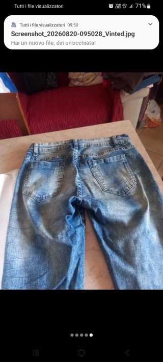 Jeans donna con rose e catene