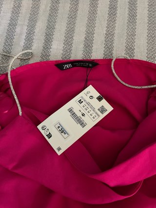 Vestito rosa con cartellino