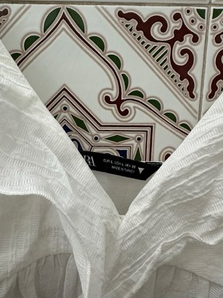 Top blanco con volantes