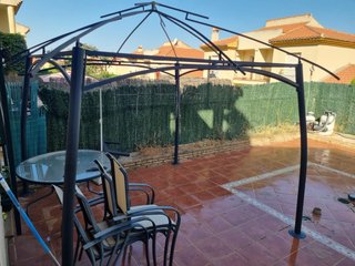 Pérgola con mosquiteras