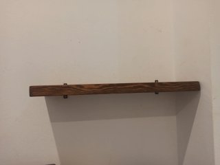 Recibidor de madera y metal