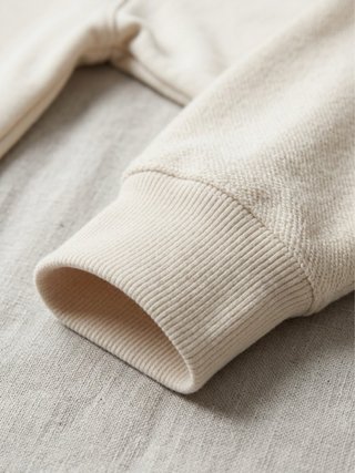 Jersey beige con cremallera