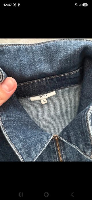 Mono vaquero sin mangas con cinturón