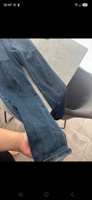 Mono vaquero sin mangas con cinturón
