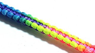 Pulsera multicolor cierre clip