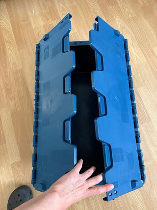 Caja de almacenaje azul de plástico