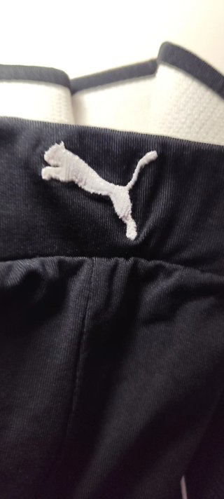 Leggings Puma Negros con Raya Blanca
