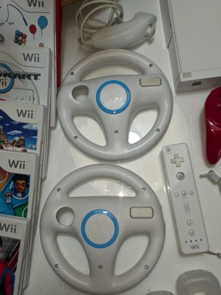 Consola Nintendo Wii con accesorios y juegos