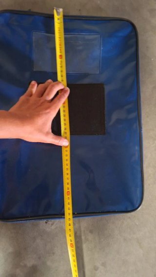 Bolsa azul con ventana y panel/valijas