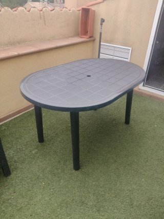 Mesa de terraza ovalada de plástico