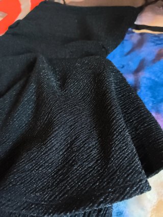 Vestido pantalon negro con volantes