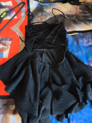 Vestido pantalon negro con volantes