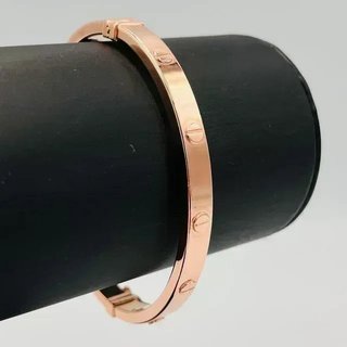 PULSERA RIGIDA TORNILLO ORO ROSA. Hueca. Oro 18k.