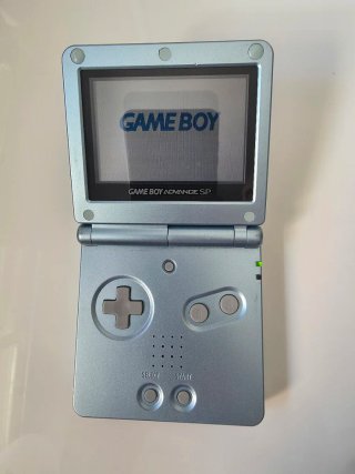 Nintendo GBA SP + Cargador + Yoshi's Island