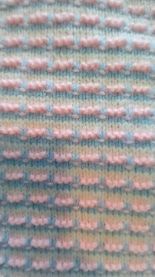 Manta bebé blanca, azul y rosa con forro rosa