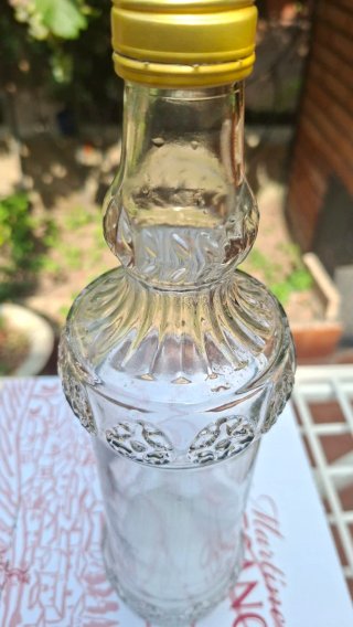 Botella de cristal decorada