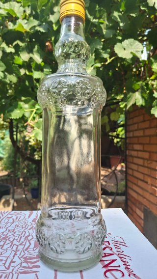 Botella de cristal decorada