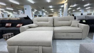 Sofá cama beige con arcón